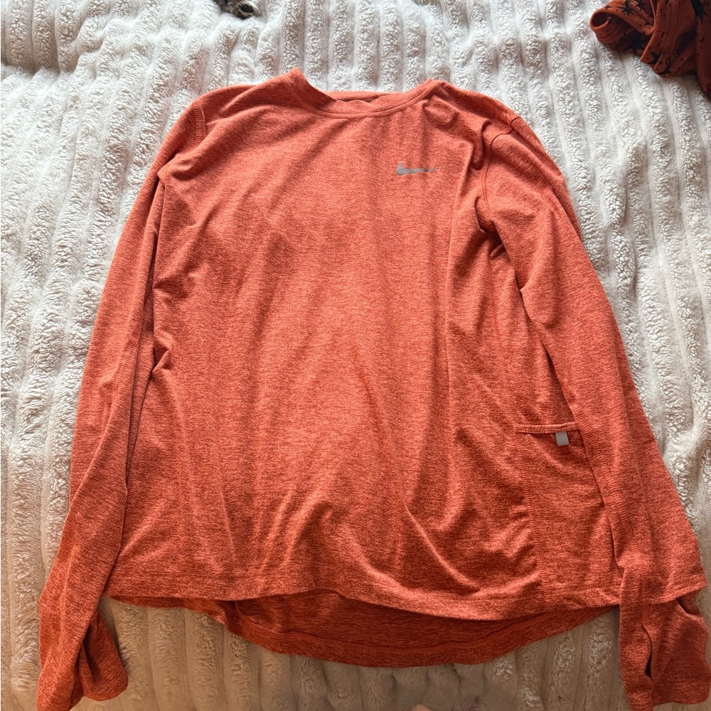 Nike dri-fit long sleeve with a pocket and thumb holes